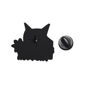 Detail view of the punk owl brooch back showing the pin and black rubber clutch