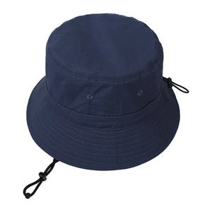 Detail view of dark blue fisherman hat with breathable eyelets and adjustable windproof cord