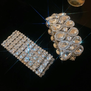 Macro shot of silver plated wide stretch bracelets with sparkling clear rhinestones