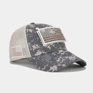 Detail of digital camouflage tactical cap featuring breathable mesh and flag patches