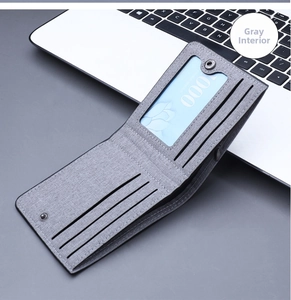 Detailed interior view of a gray men's bifold canvas wallet with card slots and a coin pocket