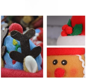Close-up of plush Christmas gift jar details showing felt fabric and reindeer antlers