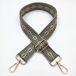 Detail of 3.8cm colorful jacquard geometric strap with gold-plated swivel metal hooks