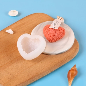 3D heart shaped silicone mold for DIY candles featuring a delicate floral pattern detail