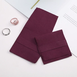 Burgundy microfiber jewelry pouch set with flap closure for rings and necklaces