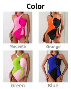 Detail view of color block one-piece swimsuits in four vibrant shades with side cut-outs