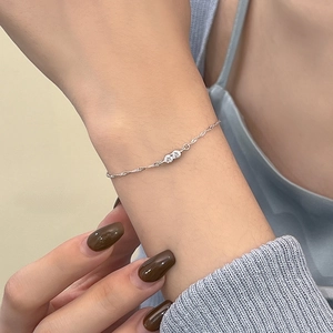 Elegant S925 sterling silver water wave bracelet with shimmering cubic zirconia accents