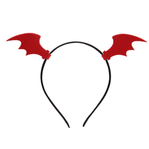 Detail of red bat wings headband for Halloween party with black flexible hair loop