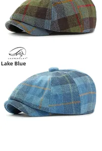 Detail of wool blend newsboy caps in lake blue and multicolor checkered patterns