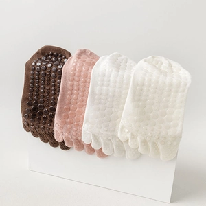 Detailed view of yoga five-finger socks with honeycomb silicone non-slip grip soles
