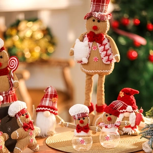 Gingerbread man and gnome Christmas candy jars with festive plush decorations
