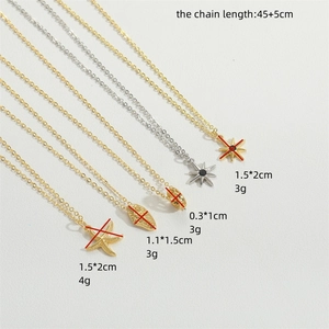 Vintage gold and silver starfish pendant necklaces set with dimensions on white background