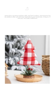 Detail of red plaid fabric mini Christmas tree with wooden base and red berries