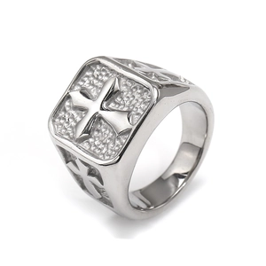 Detailed view of retro stainless steel ring with cross relief and stone texture finish