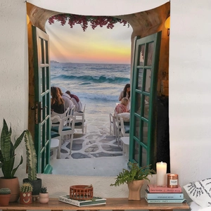 Detail of bohemian tapestry featuring a Mediterranean sunset view on a white wall