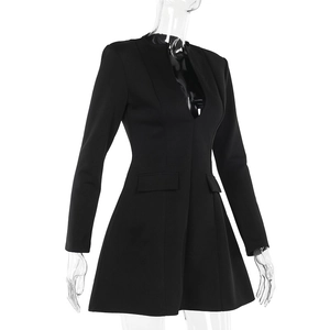 Detail view of black V-neck slim fit long sleeve dress with decorative pocket flaps