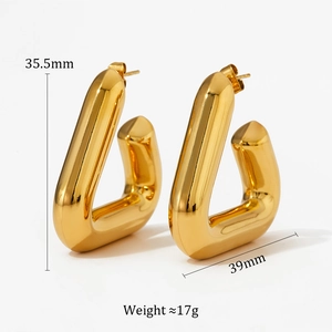 Detail view of 18K gold plated triangular hoop earrings with 35.5x39mm dimensions