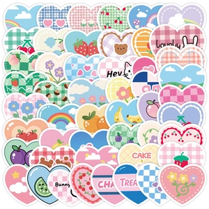 Macro view of colorful heart-shaped waterproof stickers with cute patterns for scrapbooks