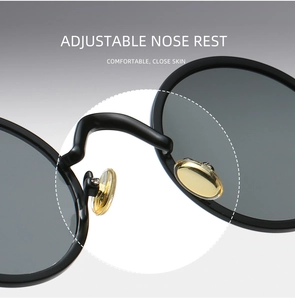 Detail der verstellbaren goldenen Nasenpads an runder Punk-Sonnenbrille für hohen Komfort
