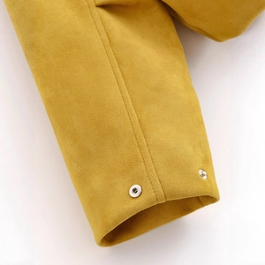 Ginger yellow suede jacket with close-up on cuff sleeves and silver metallic snap buttons