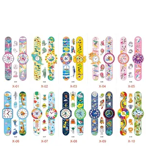 Detailed set of 10 cartoon watch-style temporary tattoos featuring dinosaurs and mermaids