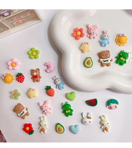 Detailed close-up of colorful resin DIY 3D charms for water bottles and phone cases