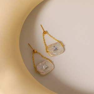 Golden chain earrings with white baroque play button pendants made of S925 silver
