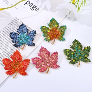 Exquisite gold maple leaf brooch pins with colorful rhinestones in five vibrant shades