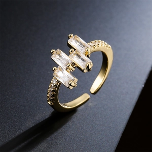 Adjustable 18K gold-plated ring featuring three rectangular AAA white cubic zirconia stones