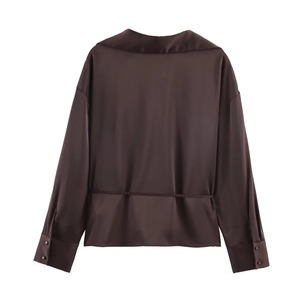Deep brown satin long sleeve blouse with belted waist design shown from back view