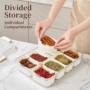 Kitchen spice organizer with 8 inner compartments and clear lid on marble countertop