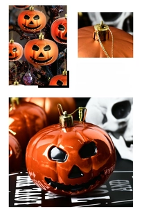 Detail of 8cm orange electroplated pumpkin ornaments with Jack-o'-lantern faces and gold cords