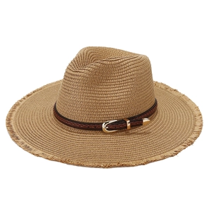 Panama straw sun hat with woven leather belt and frayed edges for beach vacation wear