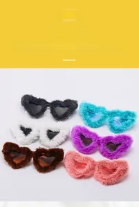 Detail showing plush heart-shaped sunglasses in six colors including black, white and purple