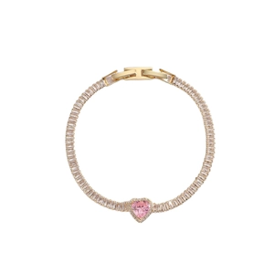 Elegant gold-plated tennis bracelet featuring a pink heart-shaped crystal centerpiece