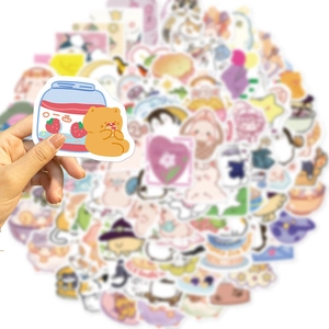Close-up of cute cartoon stickers showing a colorful bear and strawberry jam design