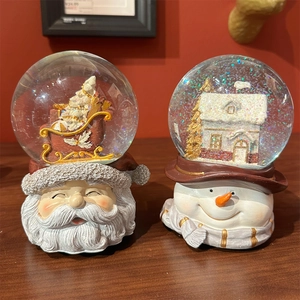 Vintage Christmas musical snow globe set with Santa Claus and Snowman resin bases