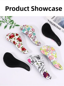 Detail view of ergonomic detangling brushes with various colorful floral and art patterns