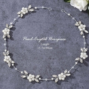 Detail of 15.7in bridal pearl and crystal hair vine accessory for wedding hairstyles