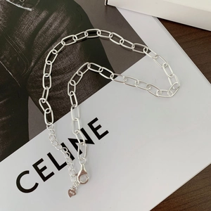 Close-up of S925 sterling silver chunky link chain necklace with heart charm detail