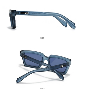 Detail view of translucent blue sunglasses with silver arrow metal décor and side hinges