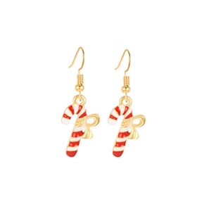 Close-up of festive candy cane earrings with golden bows for Christmas jewelry sets