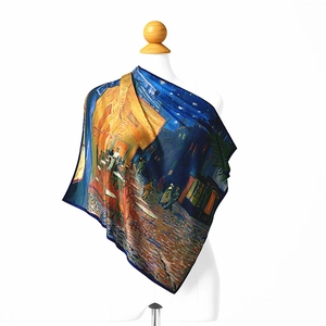 Van Gogh Cafe Terrace print silk square scarf elegantly draped on a white mannequin