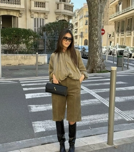 Street style olive green suede Bermuda shorts set with pleated details and soft texture