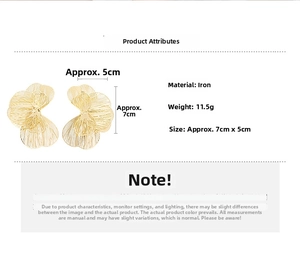Detail view of gold hollow flower earrings in iron, measuring 7cm x 5cm and weighing 11.5g