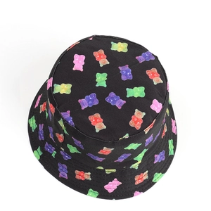 Detail of cute colorful gummy bear prints on breathable black cotton bucket hat