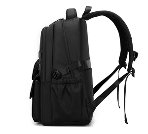 Side view of black business backpack showing durable compartments and ergonomic straps