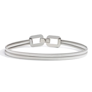 Detail of silver double-layered elastic spring metal belt with interlocking buckles