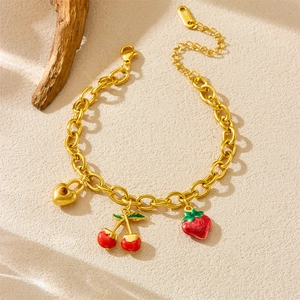 Gold-plated charm bracelet featuring 3D enamel strawberry, cherry, and heart lock charms