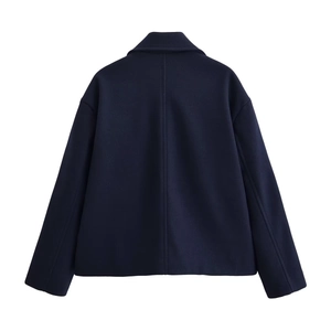 Back view of a navy blue short wool coat with a central seam and lapel collar
